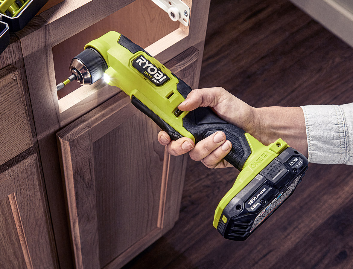 Ryobi 3/8 cordless electric drill showing a closeup of 3-jawed