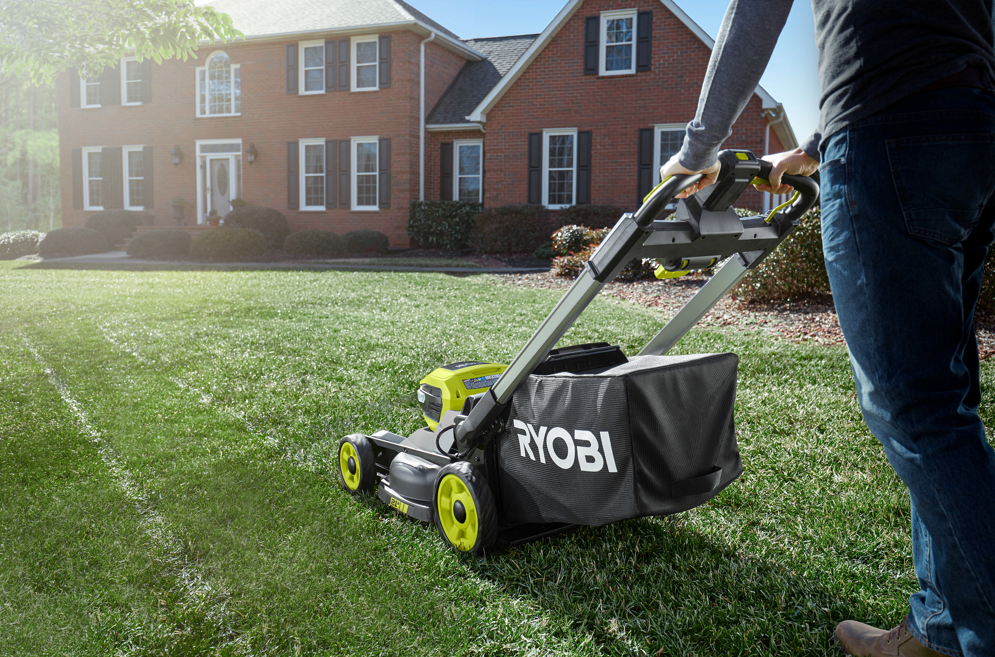 Ryobi petrol lawn discount mower