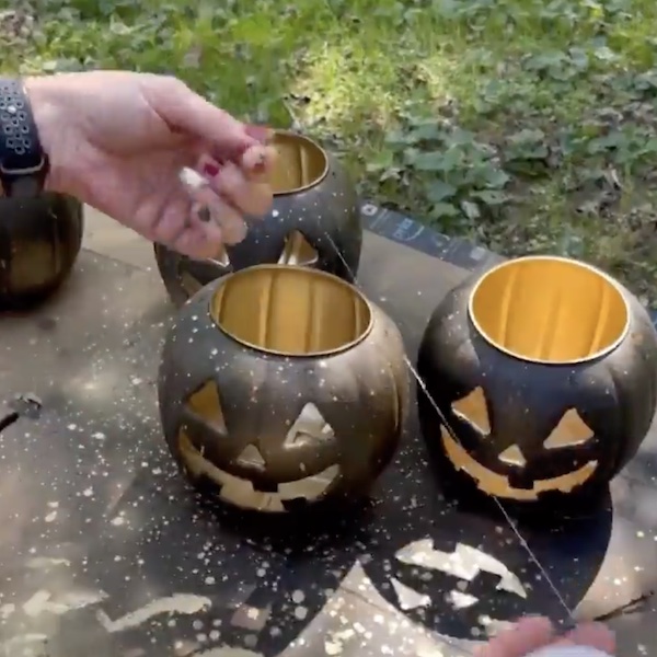 attaching fishing line to pumpkins