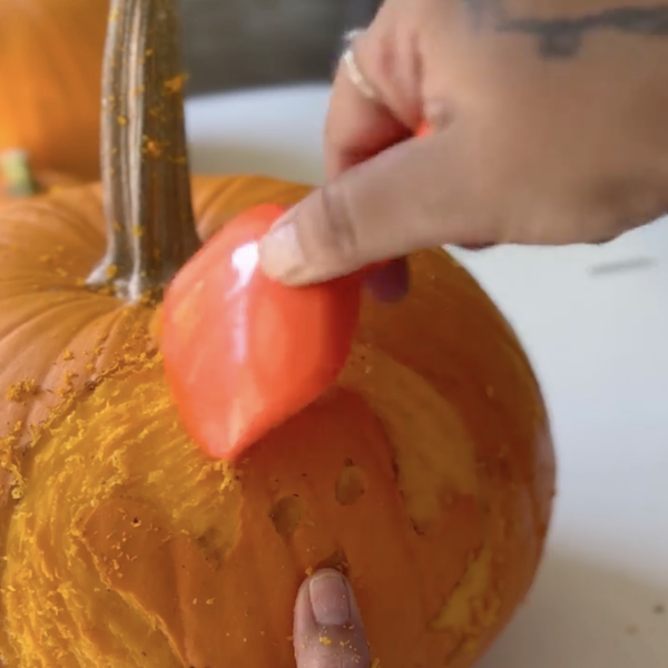 Refining the design with pumpkin scoop