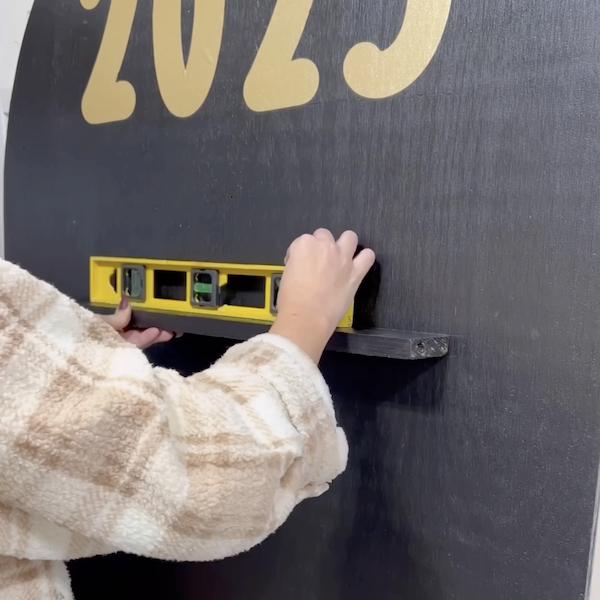 applying numbers on wood