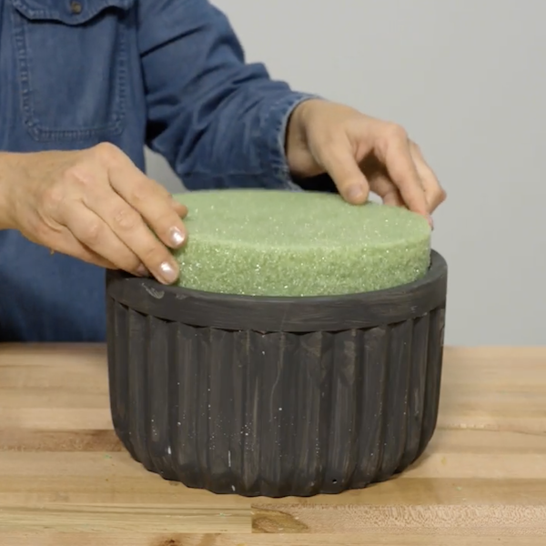 Placing foam in plant pot