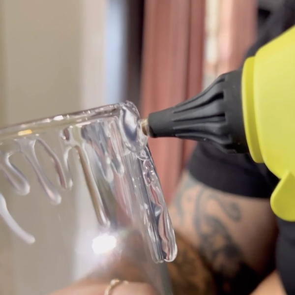 Applying glue to vase