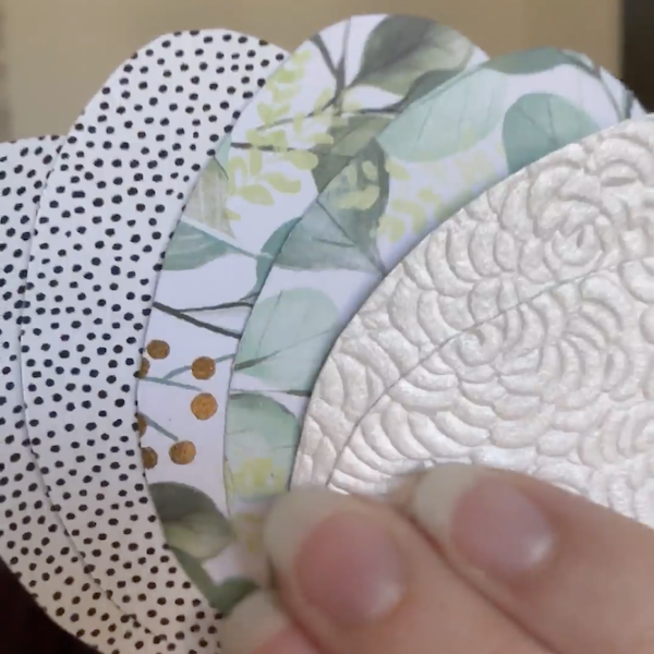 cutting out decorative paper eggs
