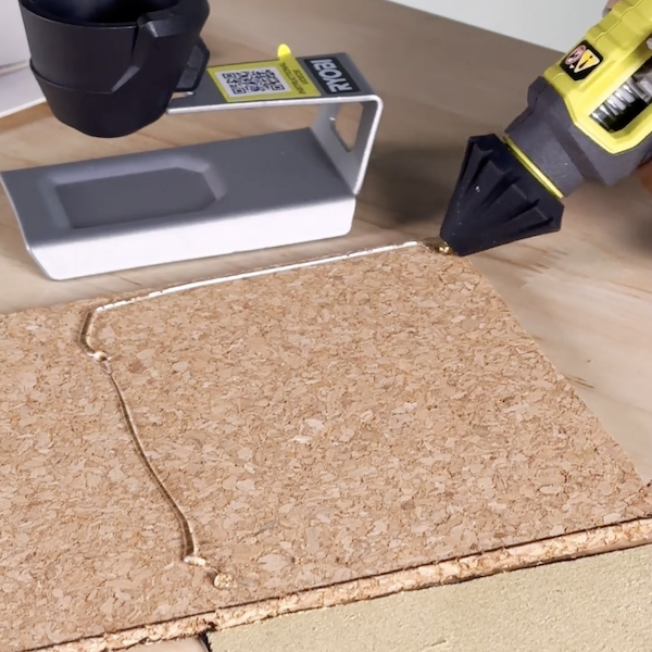 applying glue to cork