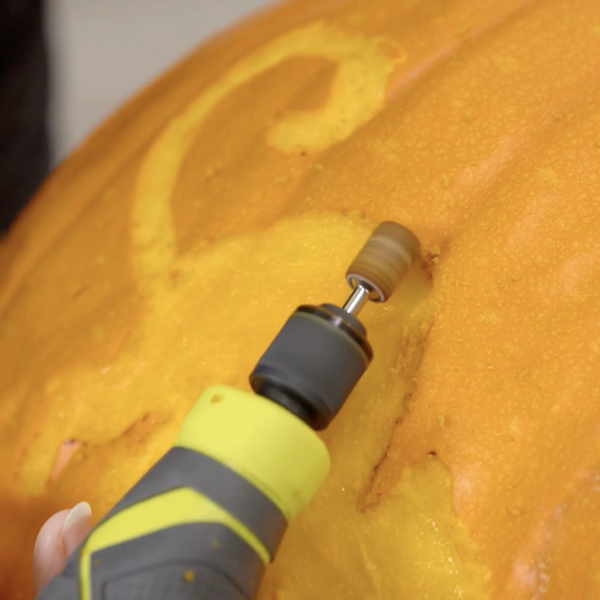 sanding the pumpkin design 