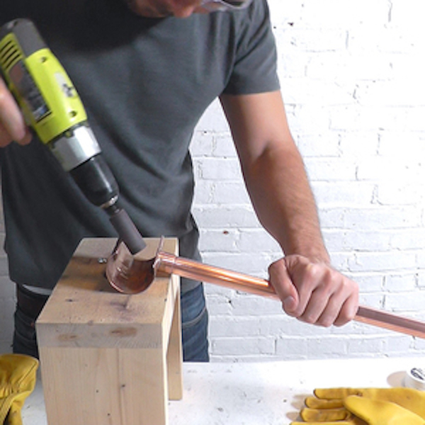 Sanding copper with a drill