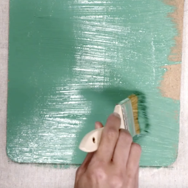 applying paint to clipboard