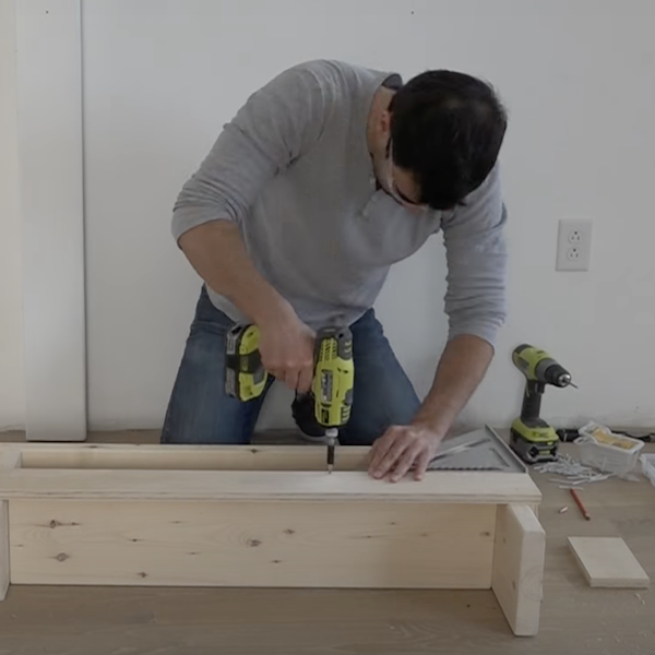 Attaching side strips to the home gym box