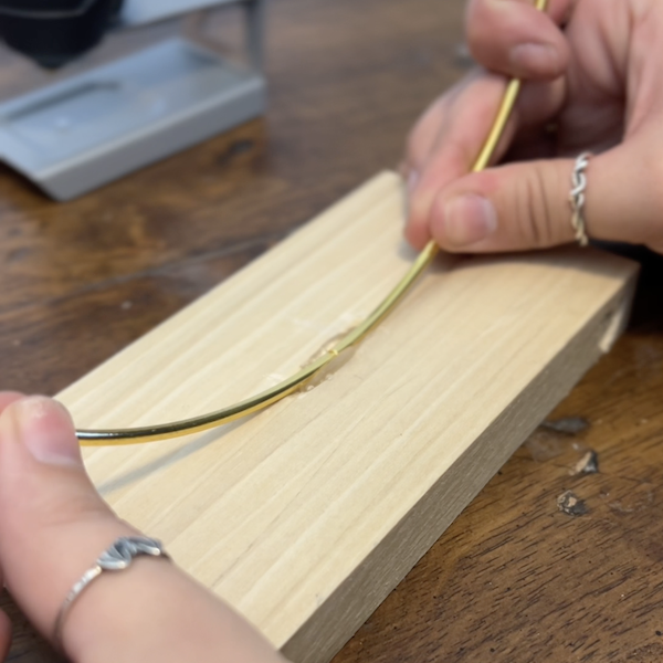 pressing the hoop into the glue