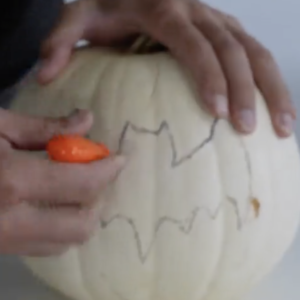 Cutting out the pumpkin piece 