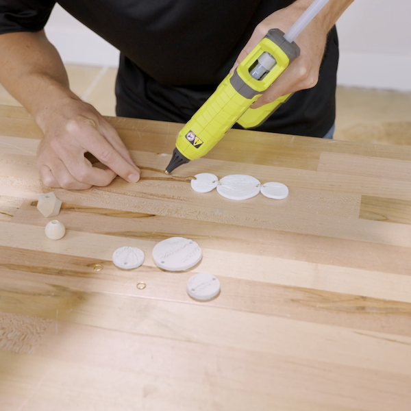 gluing leather strips.