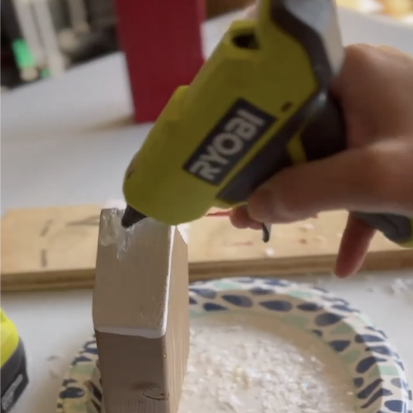 gluing snow onto the roof